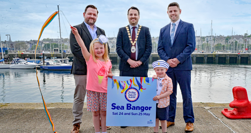 The Mayor of Ards and North Down, Councillor Alistair Cathcart, with Jack Ferguson and Matthew Stockton (Bangor Chamber of Commerce), as well as Tom and Jessica who are looking forward to completing their Sea Bangor Passport.